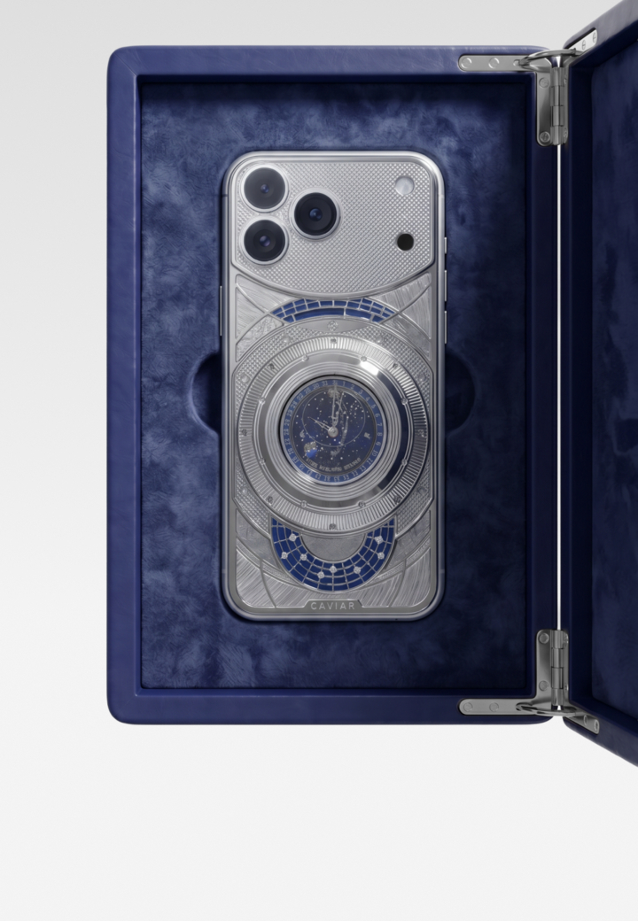 Smartphone in open collector’s case Celestial