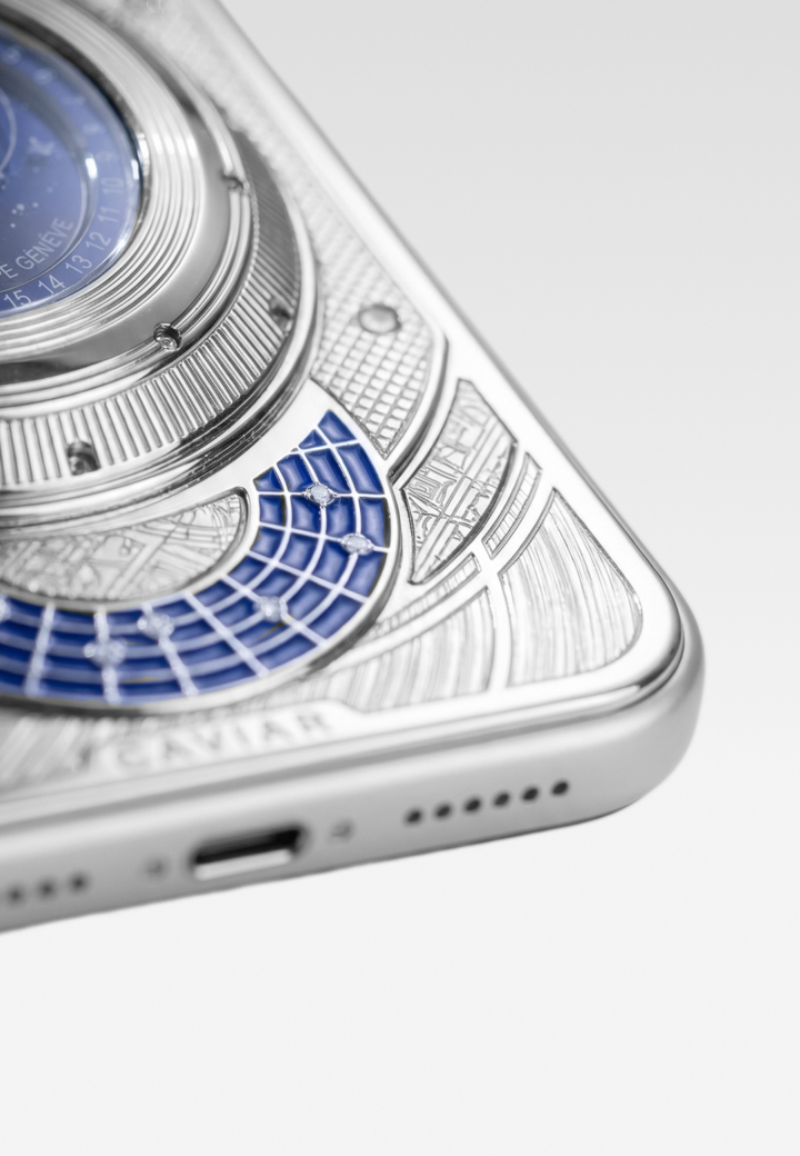 Details of hand-engraving, enamel, and logo Celestial