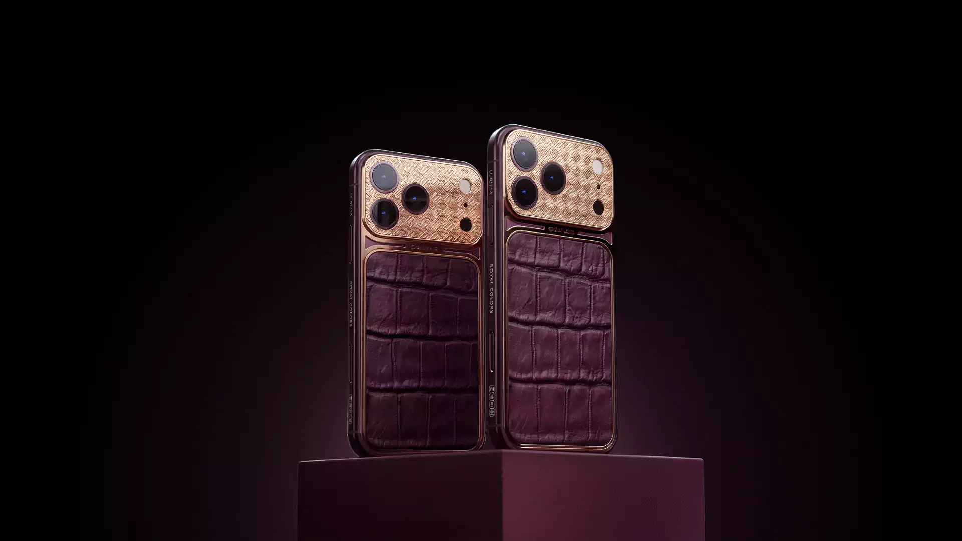 Custom iPhone Pro designs by Caviar in Dark Cherry leather with gold accents